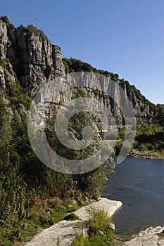 Ardeche river near VogÃ¼Ã© village, Village of VoguÌˆeÌ, Rhone-Alpes, Ardeche, France,